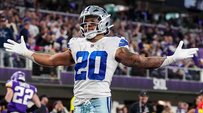 Nov 20, 2022; Minneapolis, Minnesota, USA; Dallas Cowboys running back Tony Pollard (20) celebrates his touchdown during the third quarter against the Minnesota Vikings at U.S. Bank Stadium.